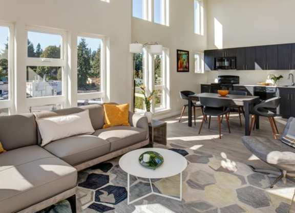 a living room with a couch and a table