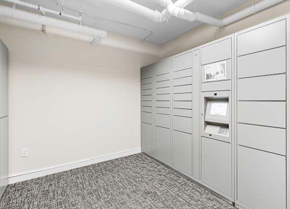 Resident Parcel Receiving Room with Package Lockers and Carpeted Floor at Sir Gallahad Apartment Homes, Washington