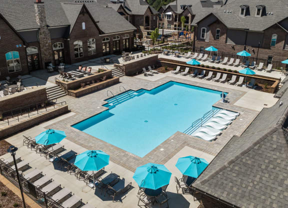 an aerial view of the resort style pool with lounge chairs and umbrellas at Griffin Weston, North Carolina