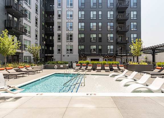 Pool with mid-rise apartments overlooking