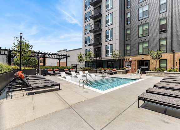 Outdoor pool with lounge chairs