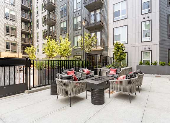 outdoor lounge area with chairs