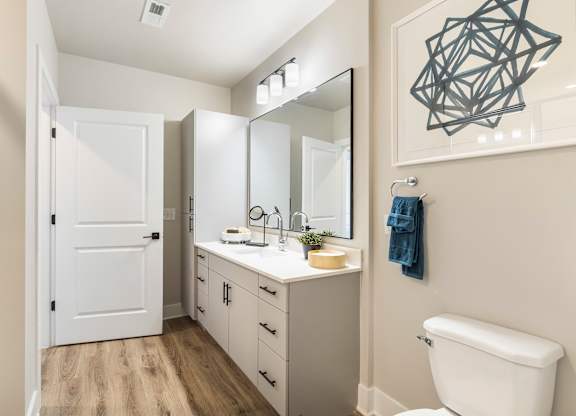 Bathroom with custom cabinets and vanity
