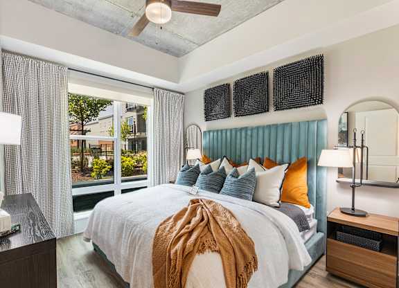 Spacious bedroom with ceiling fan