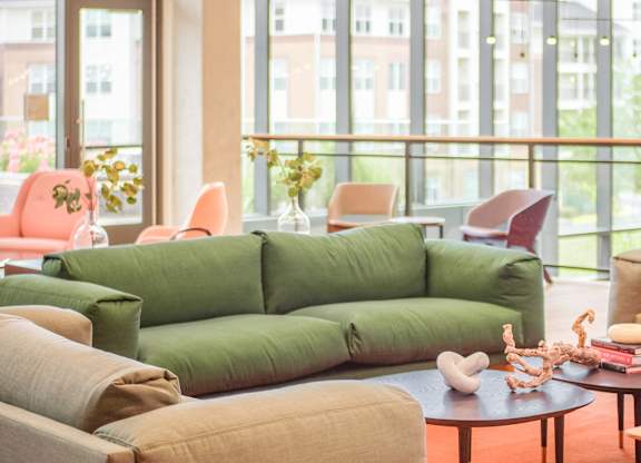 a living room with couches and chairs and a coffee table at Makers Rise, Virginia  