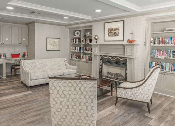 Living room with a fireplace at The Marque, Gainesville, VA, 20155