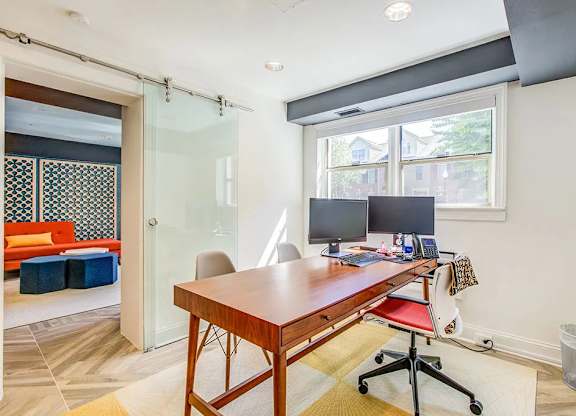 desk and computers at Park Georgetown Apartments, Virginia