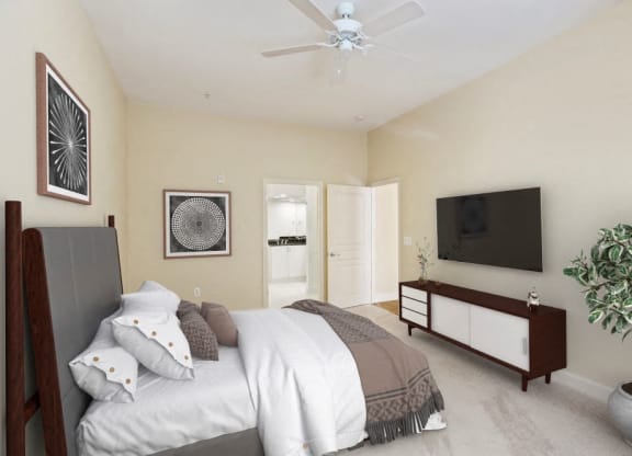 Bedroom with cozy bed and TV at The Mark at Dulles Station, Herndon