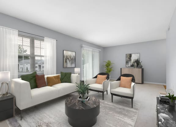 a living room with grey walls and white couches and chairs at West Pointe Apartments in Burlington, NC