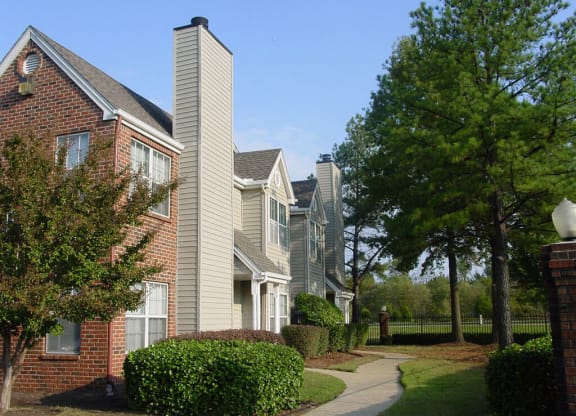 A residential area with houses and a clear sky at The Trails at Mt. Moriah, Tennessee