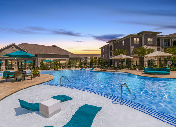 Pool And Sundeck at Cue Luxury Apartments, Cypress, TX, 77433