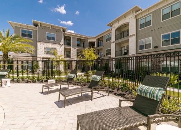 Poolside Sundecks at Cue Luxury Apartments, Cypress
