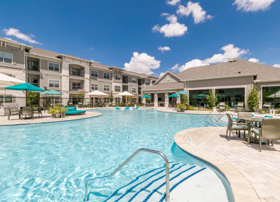 Glimmering Pool at Cue Luxury Apartments, Cypress, TX