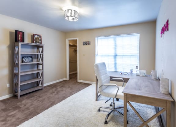 a home office with a desk and chair and a large window at The Trails at Mt. Moriah, Memphis, Tennessee