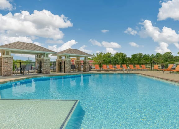 the swimming pool at the estates apartments at Bramblett Hills Luxury Apartments in O Fallon MO 63366
