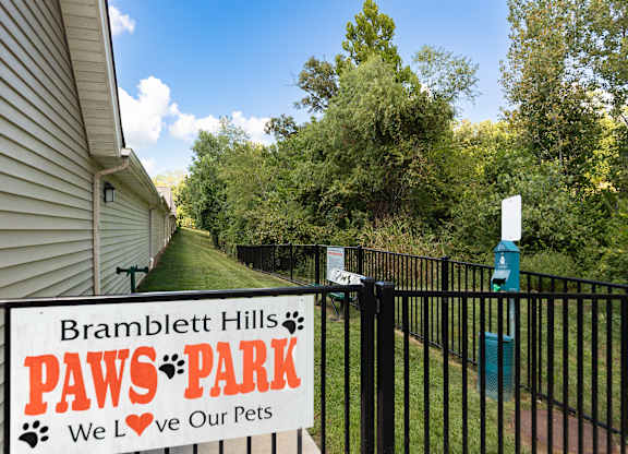 An apartment community dog park  at Bramblett Hills Luxury Apartments in O Fallon MO 63366