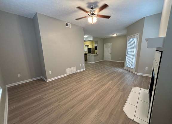 Fenwick Place Apartments in Louisville, KY 40220 - Living room looking into the kitchen