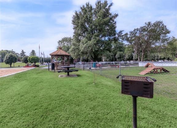 a park with a playground and a gazebo