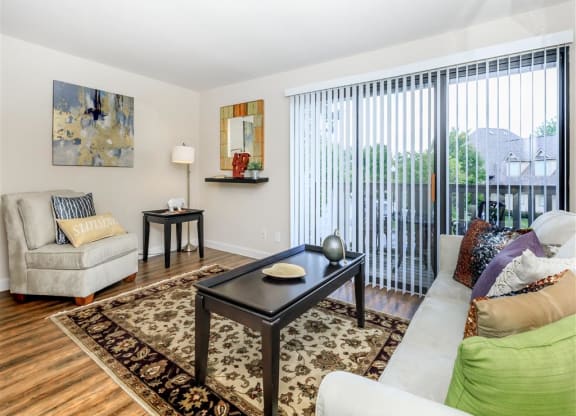 a living room with a couch and a table