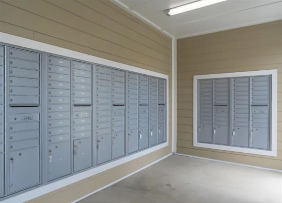 a row of lockers in a room with a window
