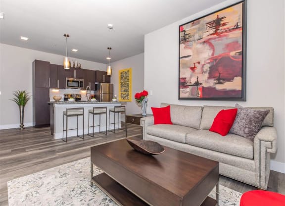 a living room with a couch and a table