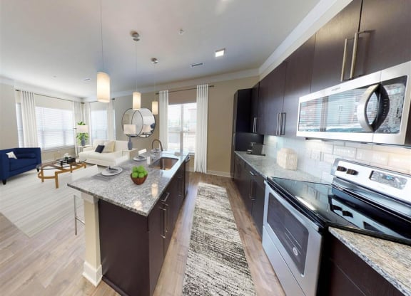 a kitchen and living room with a counter top