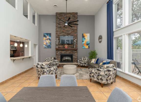 A living room with a fireplace and a couch.