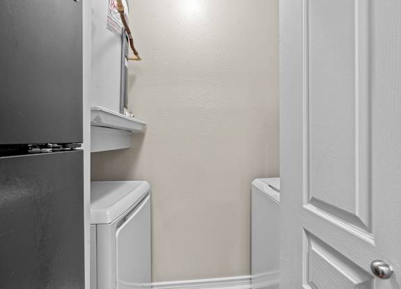A white door is on the right side of the image.