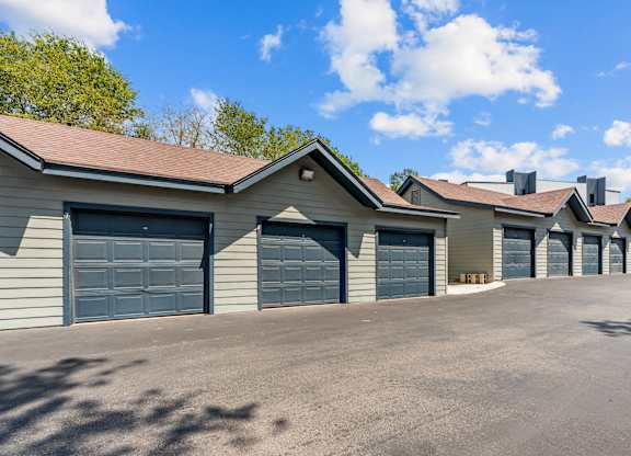 A row of garage doors are closed.