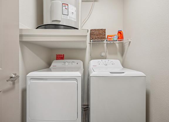 white dryer and washer at Vine + Vail Townhomes and Apartments, Grapevine, 76051