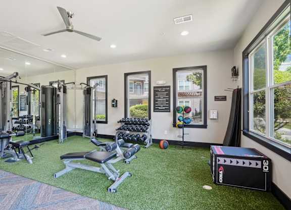Strength training area with free weights and fitness equipment at Highline Urban Lofts Apartments, Texas, 77429