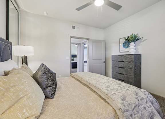 bedroom with a large bed at Vine + Vail Townhomes and Apartments, Grapevine, 76051