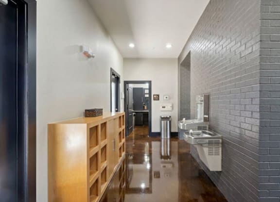 A bathroom with a sink and mirror.