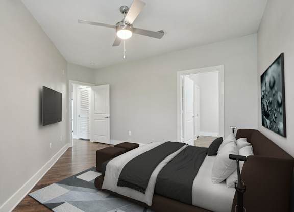 Modern bedroom with ceiling fan and platform bed at Highline Urban Lofts Apartments, Cypress, 77429