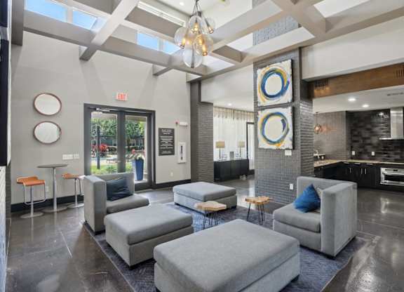 Clubhouse lounge with kitchen and skylights at Highline Urban Lofts Apartments, Cypress