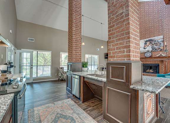 Kitchen with Brick Chimney at Bardin Oaks Apartments, Arlington, TX