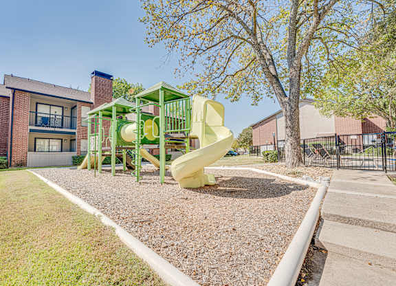 Community playground at Bardin Oaks Apartments, Texas, 76018