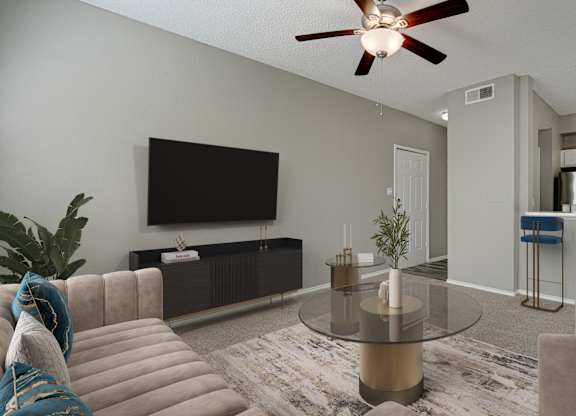 Open living room with kitchen bar seating at Carmel Creekside Apartments, Fort Worth, Texas