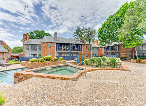 A house with a pool in the backyard.