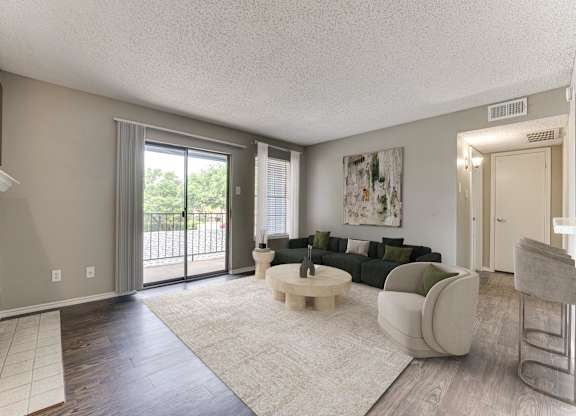 A living room with a fireplace and a couch.
