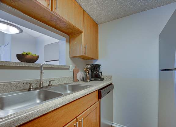 kitchen with a sink at Timberglen Apartments, Dallas, TX