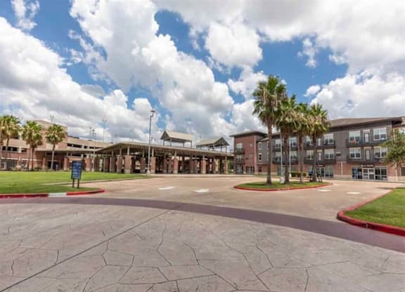 A large open plaza with a building in the background.