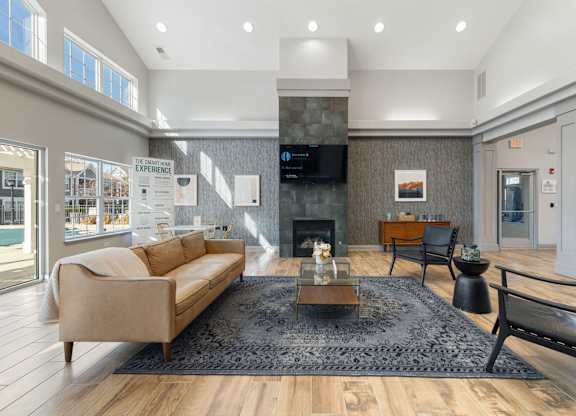 A living room with a fireplace and a couch.