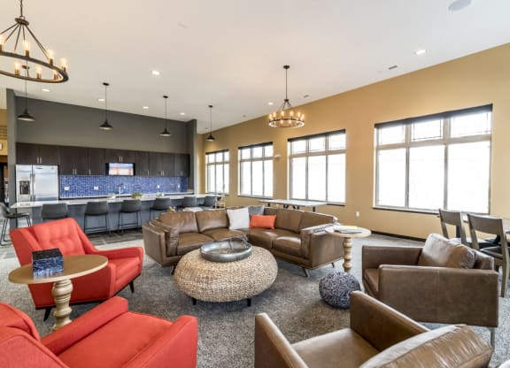 Clubhouse with seating and deluxe kitchen for entertaining at 360 at Jordan West best new apartments West Des Moines IA 50266