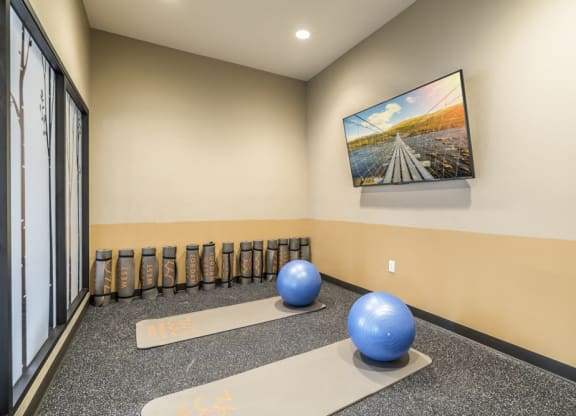 Yoga room with on-demand classes at 360 at Jordan West best new apartments West Des Moines IA 50266