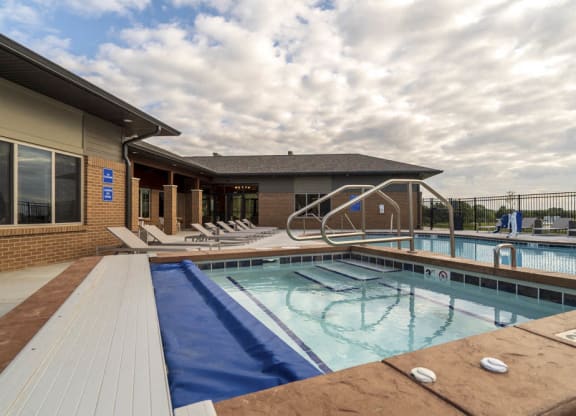 Hot tub and swimming pool at 360 at Jordan West best new apartments West Des Moines IA 50266