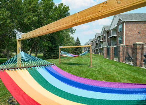rainbow striped hammock outside the clubhouse at Williamsburg Park apartments in Lincoln