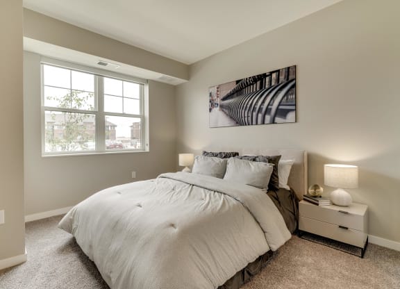 Bedroom with walk-in closet at Ascend at Woodbury in Woodbury MN