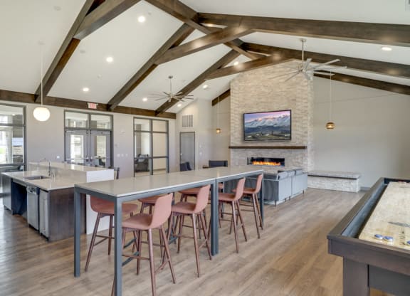 Clubhouse with seating, TV lounge and kitchen at Ascend at Woodbury MN 55129 new luxury apartments