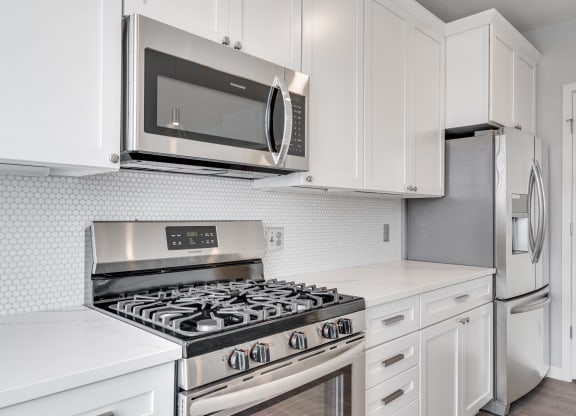 Matching stainless steel appliances in the kitchen of a luxury apartment home at Aspire at CityPlace in Woodbury, Minnesota